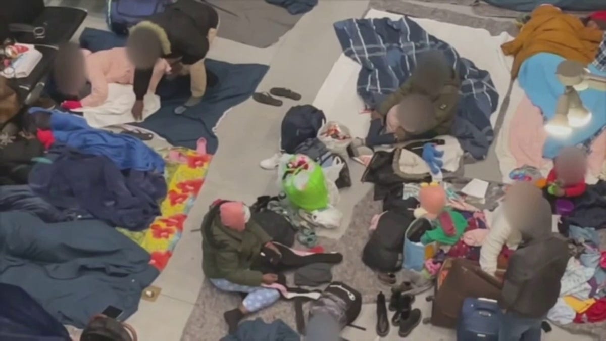 migrants at Logan Airport