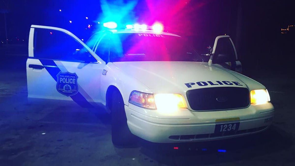 Philadelphia Police car at night