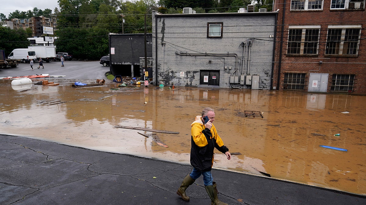 floodwaters rise in Asheville