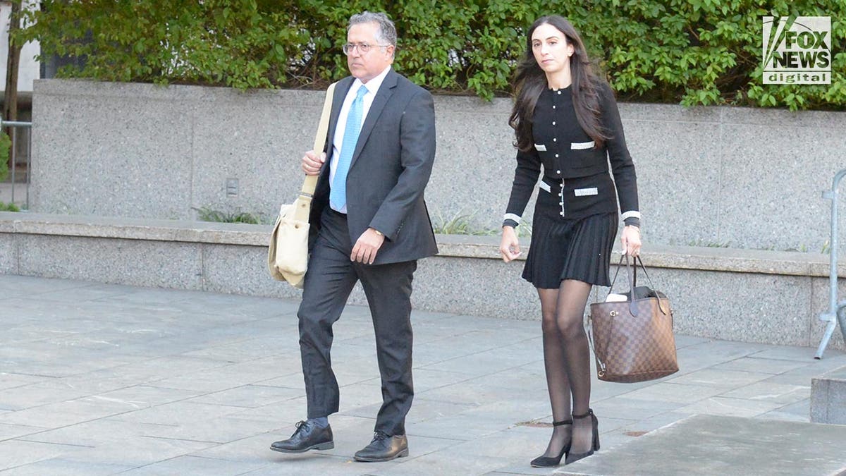 Marc Agnifilo and Tenny Geragos carry briefcases into Sean Diddy Combs court hearing