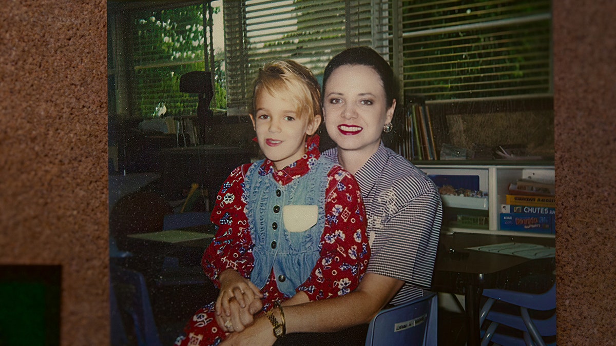 JonBenét Ramsey sitting on her mother Patsy Ramseys lap.