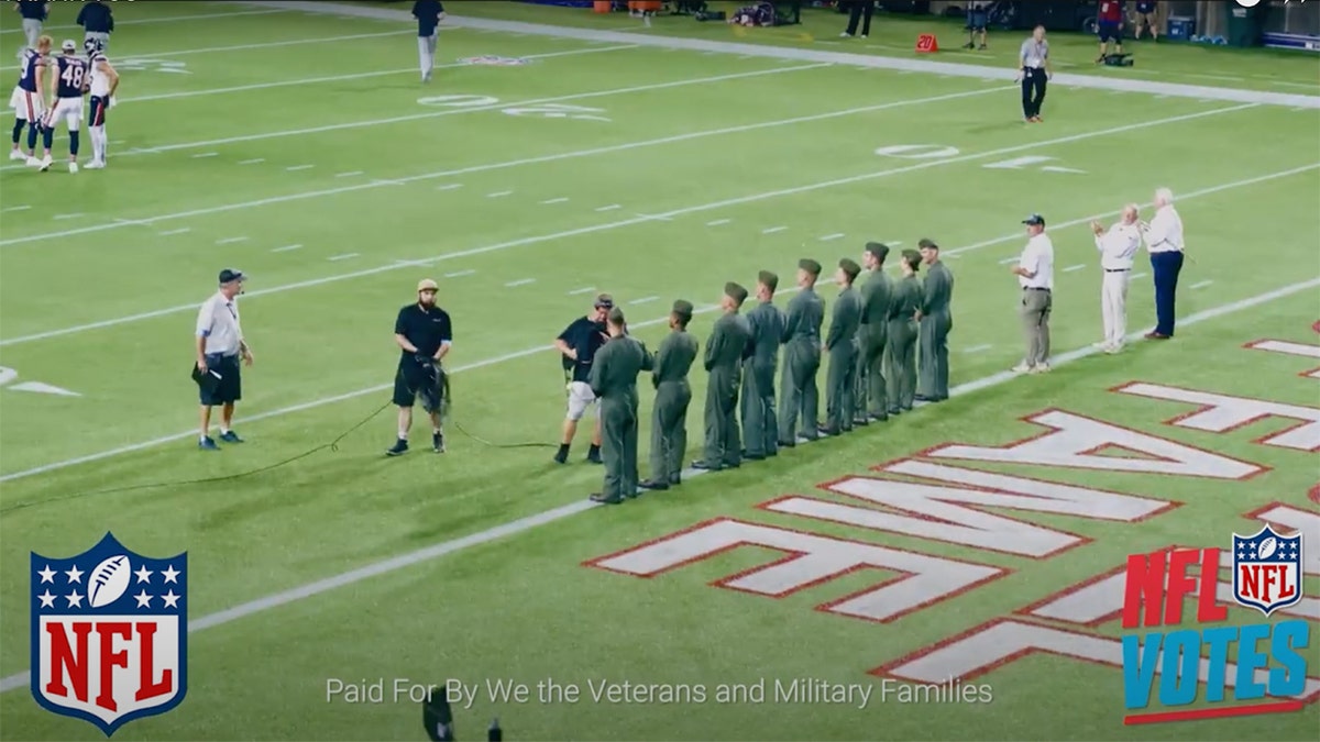 Veterans on the field at NFL game