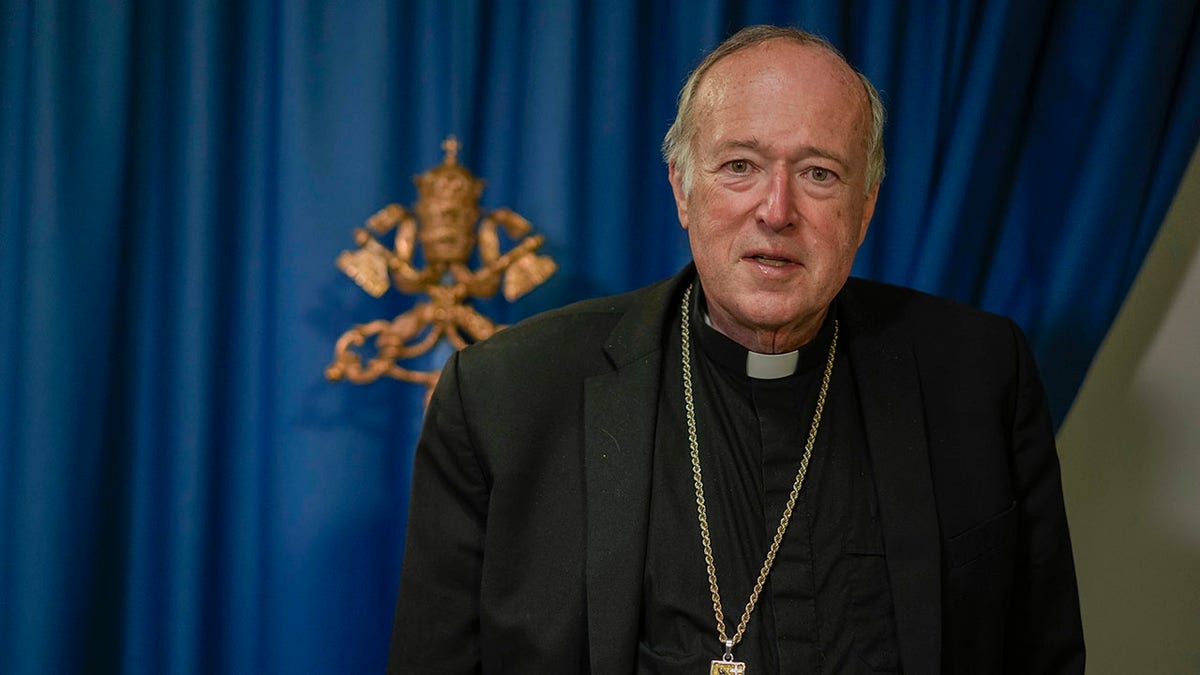 McElroy poses for a photo at the Vatican