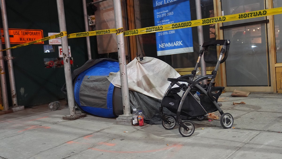 homeless tent in street corner