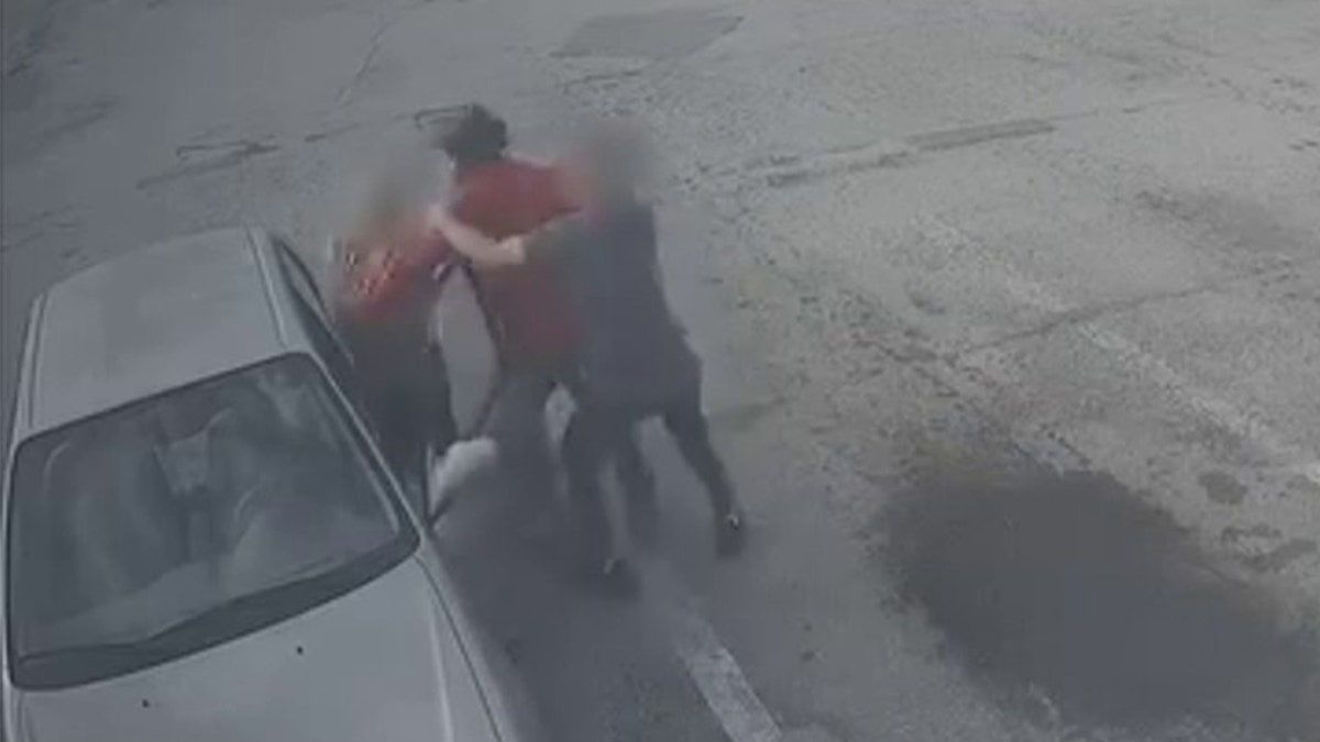 Suspect attacks woman