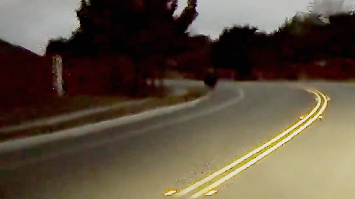 Grainy dashcam video shows a lone figure walking near Mendoza Olmos' home minutes after she was last seen leaving on Christmas Eve
