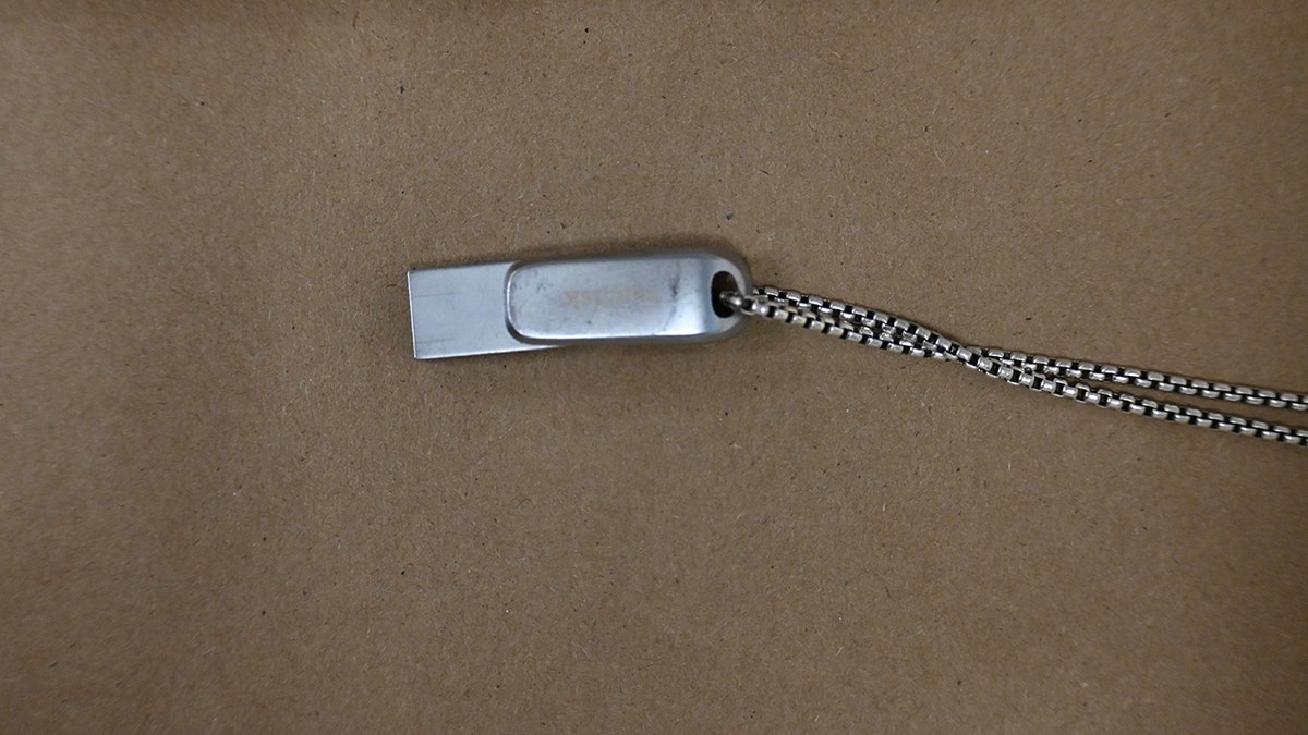 Evidence photos of Luigi Mangione's USB from the arrest for UnitedHealthcare CEO Brian Thompson murder