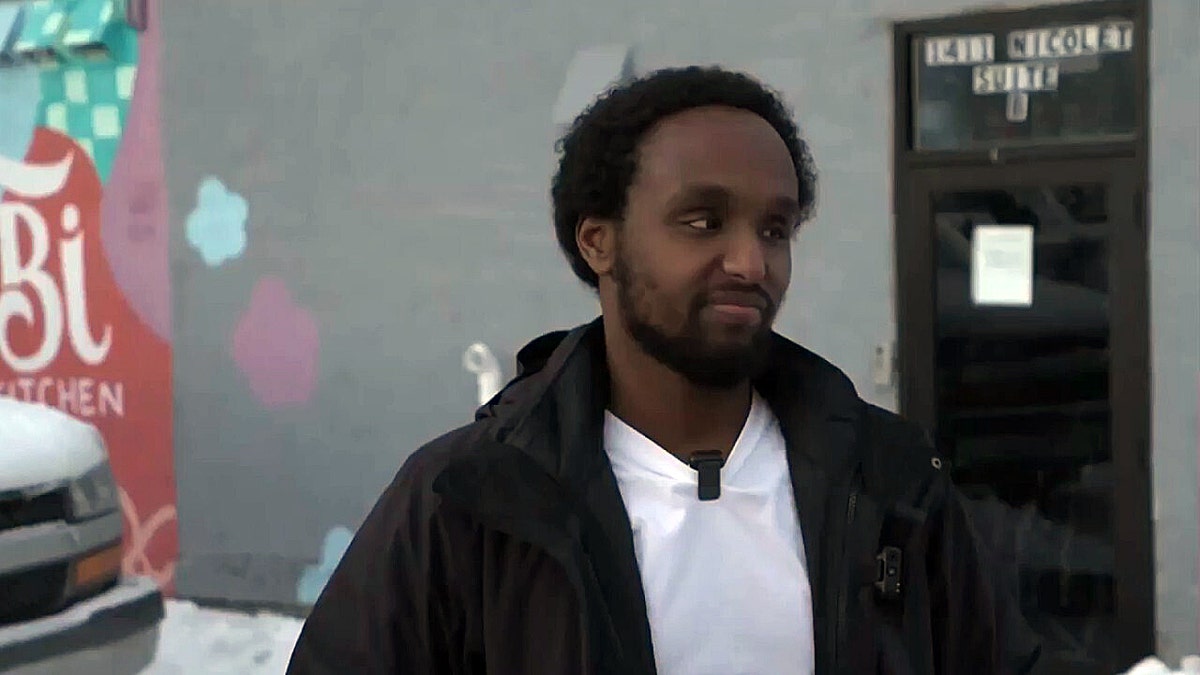 Ibrahim Ali standing outside the daycare.