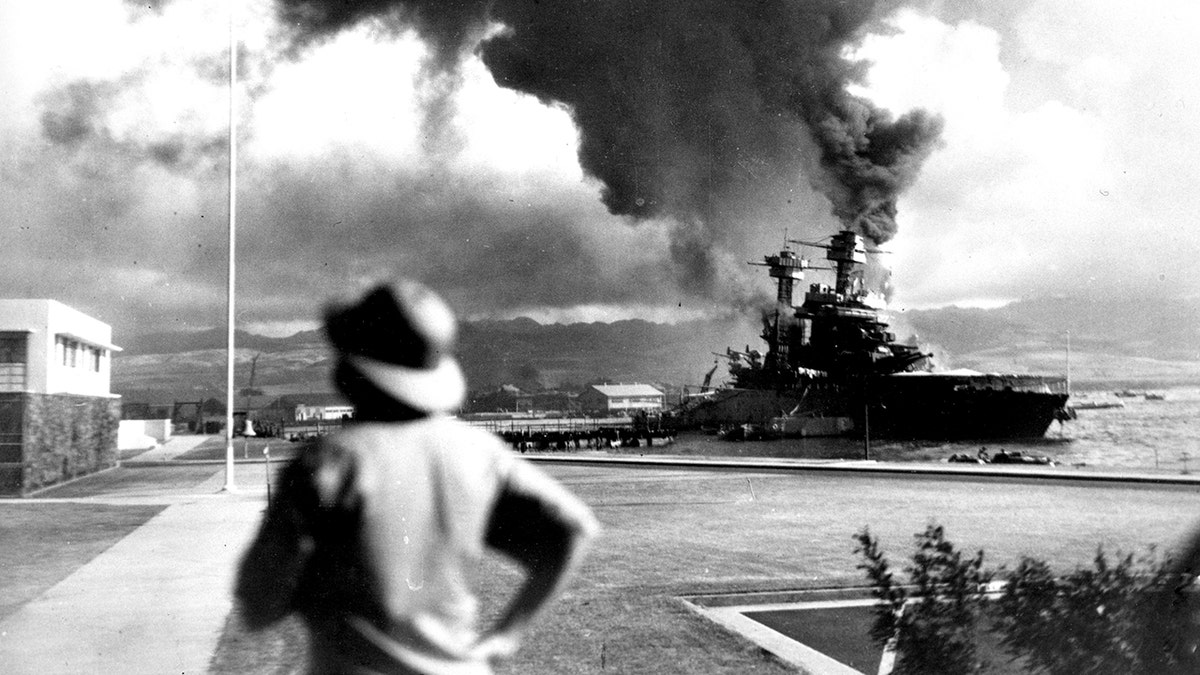 American ships burn during the Japanese attack