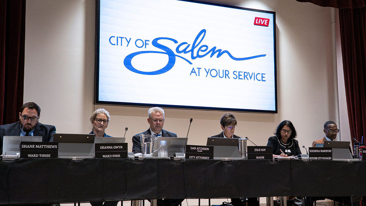 Members of Salem City Council sit at meeting