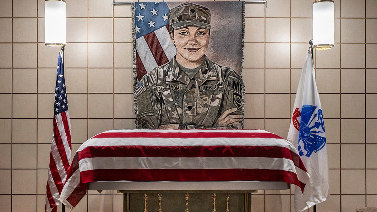 Painting of U.S. Army Spc. Sarah Beckstrom and her casket