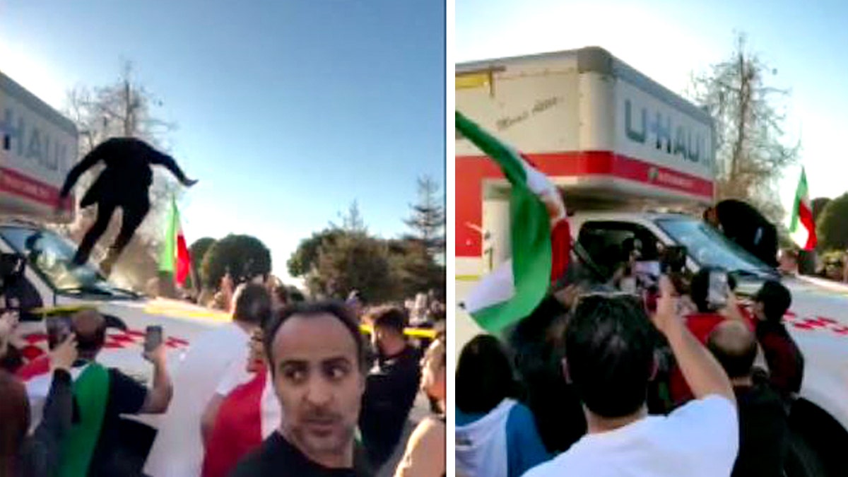protesters swarm U-Haul truck