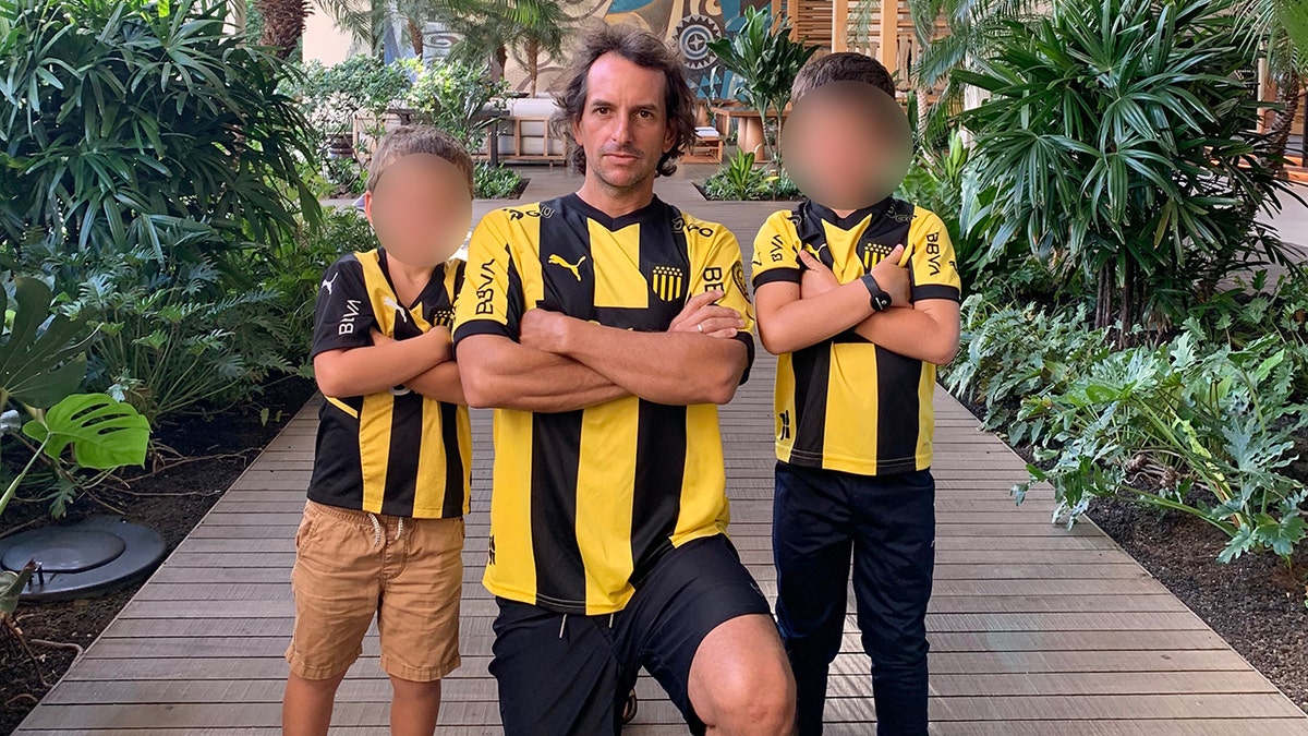 Nick Mastrascusa and young children