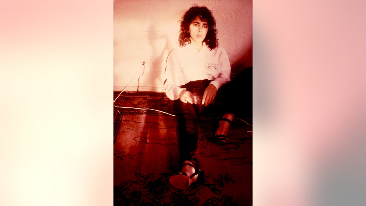 A photo of a young Laura Greenberg.