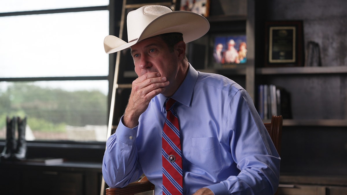 Texas Ranger Jim Holland with his cowboy hat on during his interview.