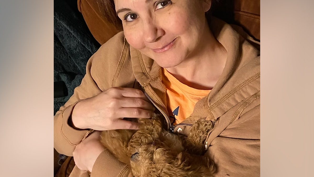 Aryan Papoli with a dog