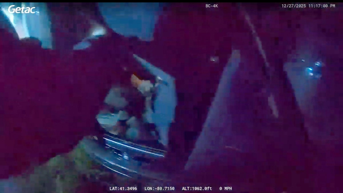 Officer Mosora pulled the driver from the car