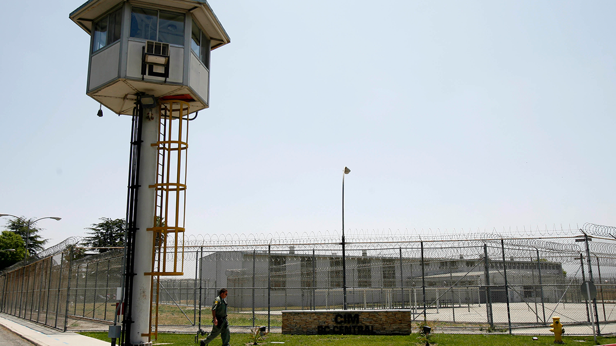 Guard patrols California Institution for Men in Chino