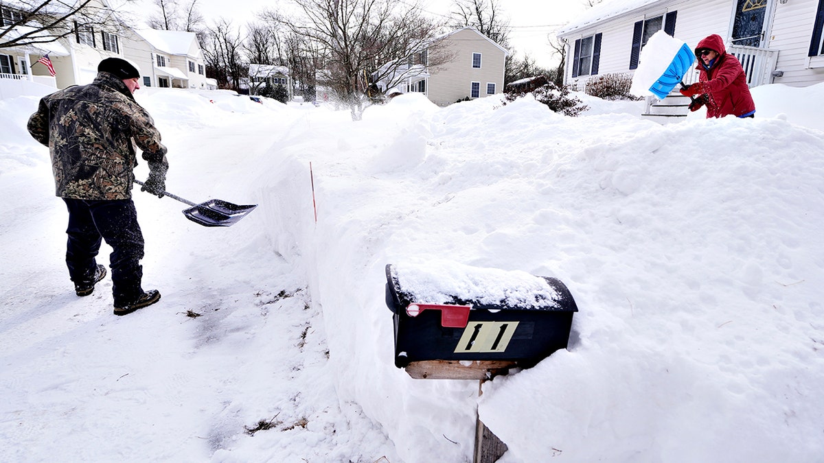 residents dig out driveway in Haverhill