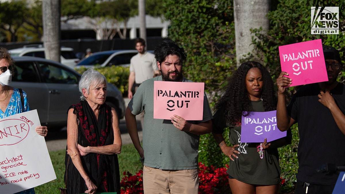 Activists gathered outside the Palantir headquarters in the Aventura area of Miami, Florida, during a demonstration.