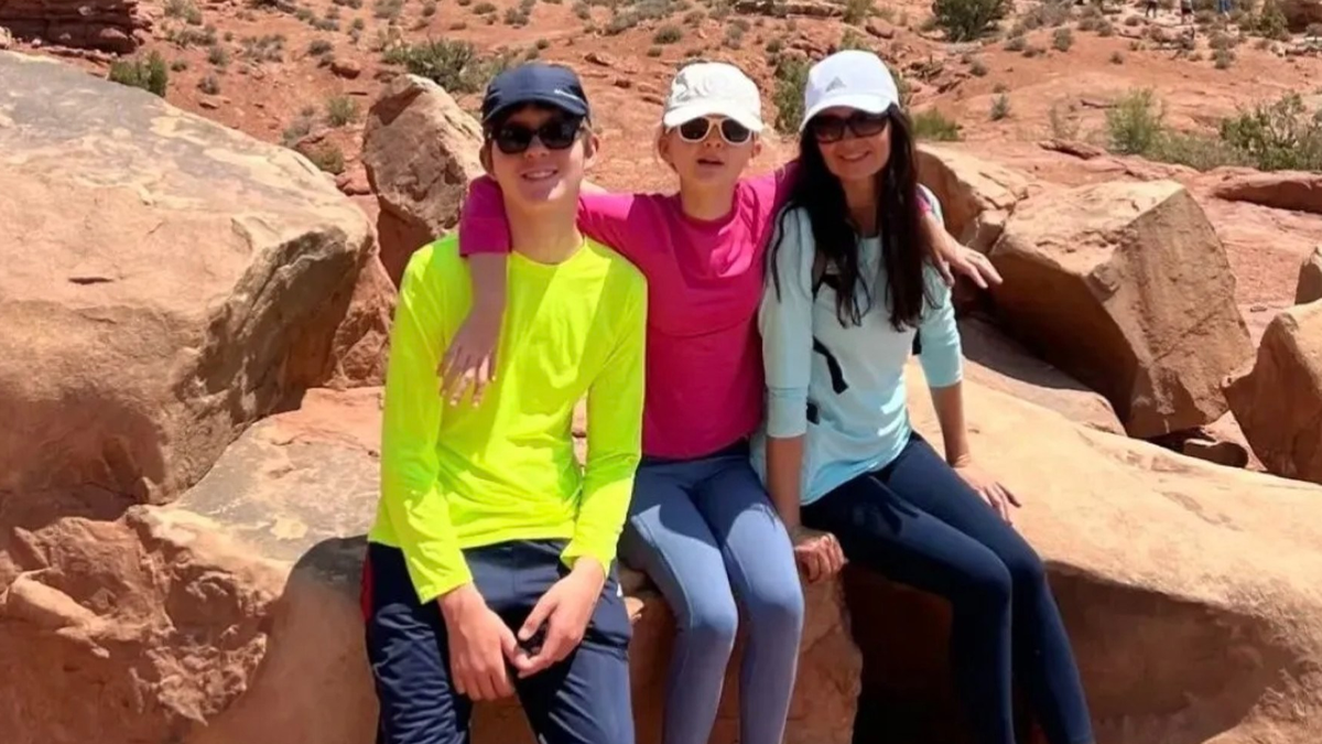 Monika Rubacha poses with her children, Josh James and Emma James, in a family photo taken outdoors prior to the Lakewood Ranch, Florida homicide-suicide