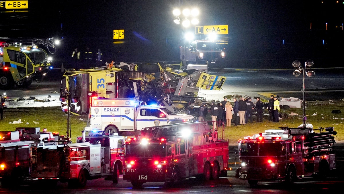 Emergency crews responding to a plane collision on the tarmac at LaGuardia airport