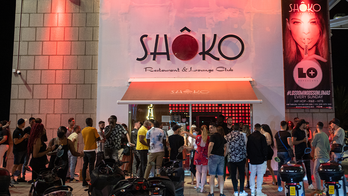 Young people queue to enter the Shoko nightclub 