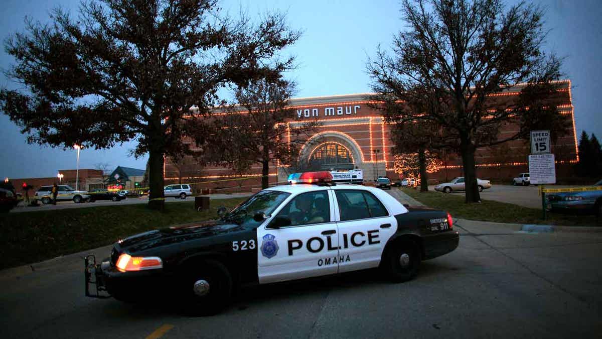 A police car parked in front of the Von Maur store at Westroads Mall in Omaha