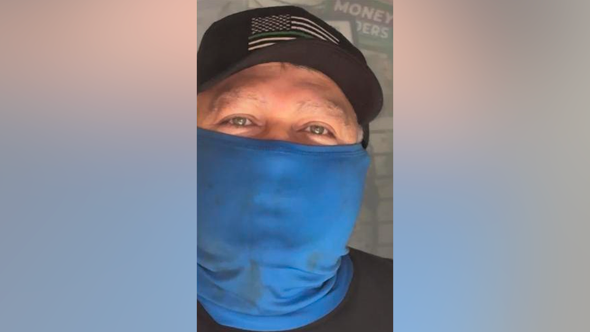 Jaime Alvarez-Gonzalez wearing face covering and hat in image cited by prosecutors