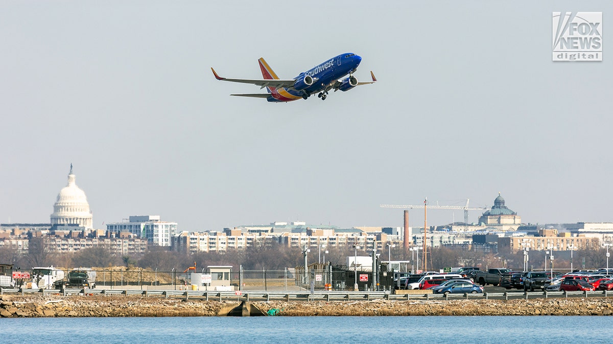 Southwest aircraft taking off from Reagan National Airport runway