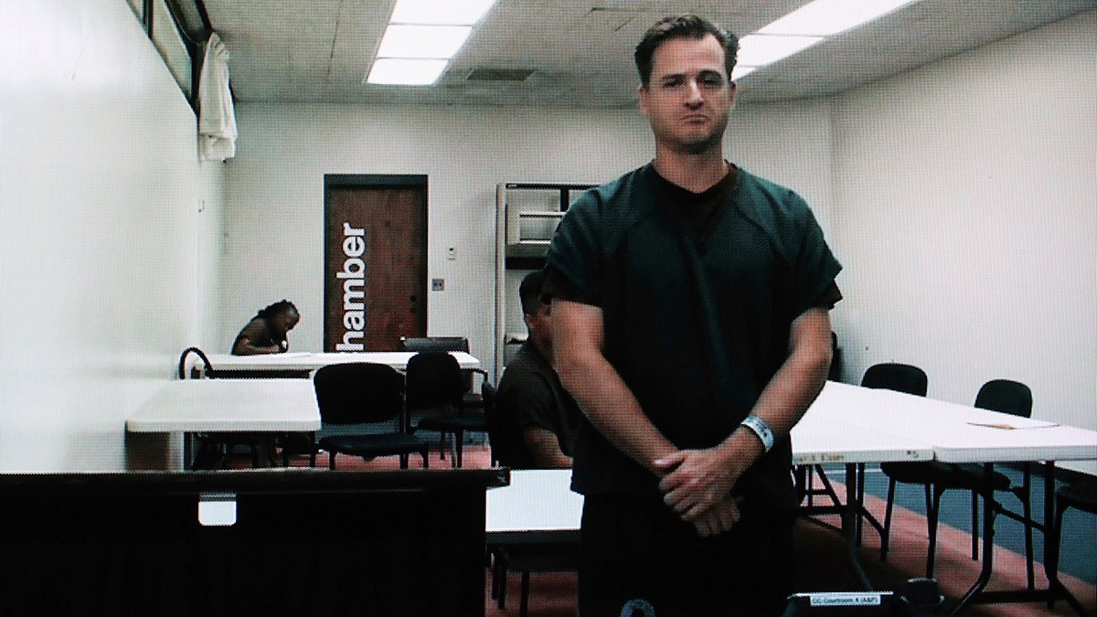 Hawaii doctor Gerhardt Konig appearing via video in courtroom during arraignment hearing