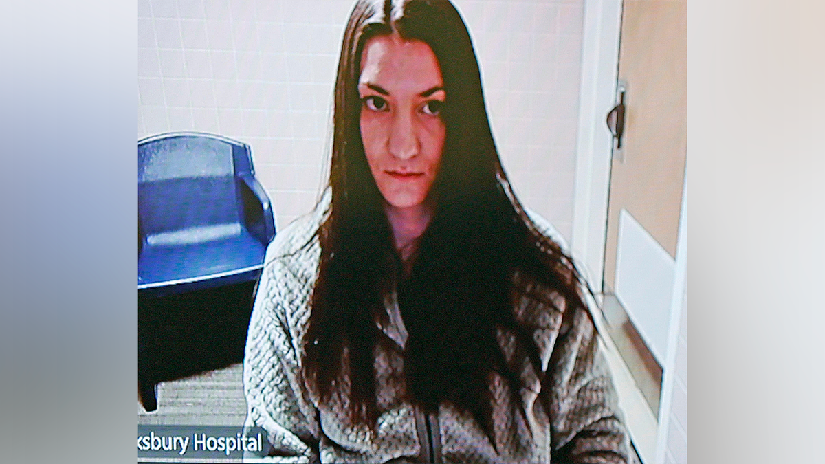 Massachusetts mother accused of killing her three children appears during hospital video appearance
