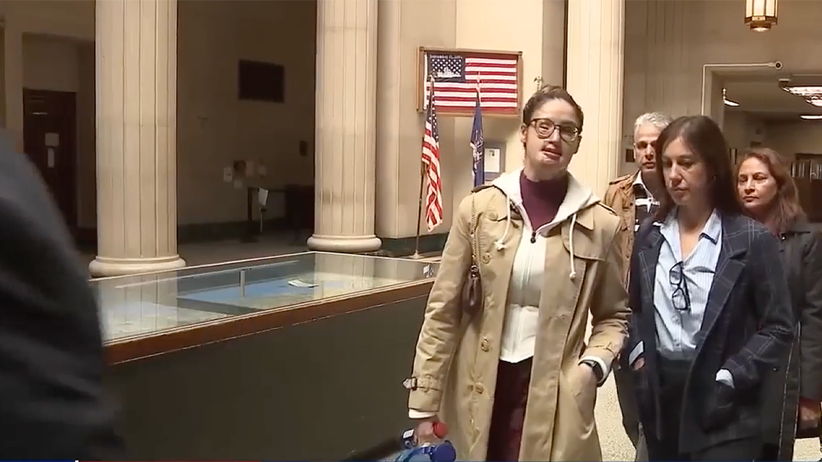 Nafiah Ikram walks into court and Shaquille Coke appears in courtroom in NYC acid attack case