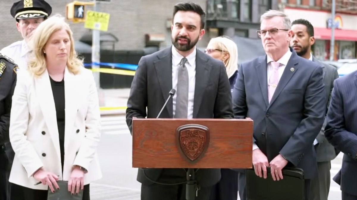 Mamdani, flanked by Police Commissioner Jessica Tisch, left, and Chief of Detectives Joseph Kenny, speaking during a news conference, Wednesday, April 1, 2026, in New York.