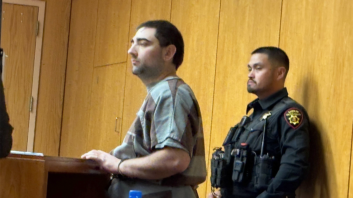 Suspect Daniel Moreno-Gama stands in court with a sheriff’s deputy after alleged attack on Sam Altman’s home and OpenAI HQ