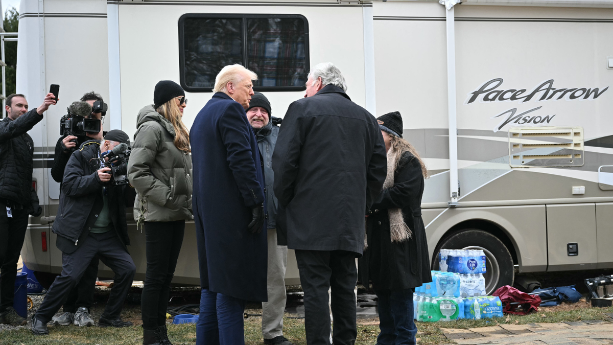 President Donald Trump and First Lady Melania Trump visiting a neighborhood in Swannanoa, North Carolina
