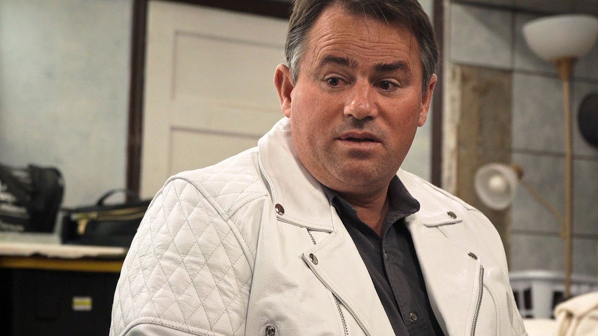 Samuel Bateman standing in a scene from Trust Me: The False Prophet Season 1