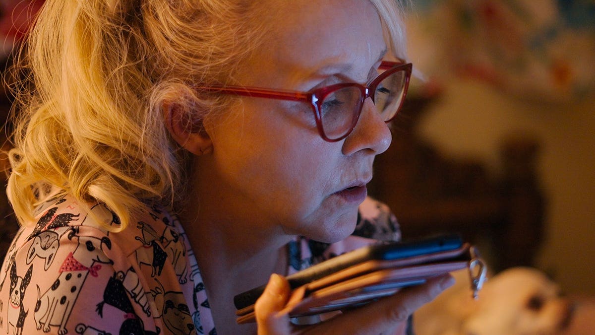 Christine Marie standing in a scene from Trust Me The False Prophet Season 1