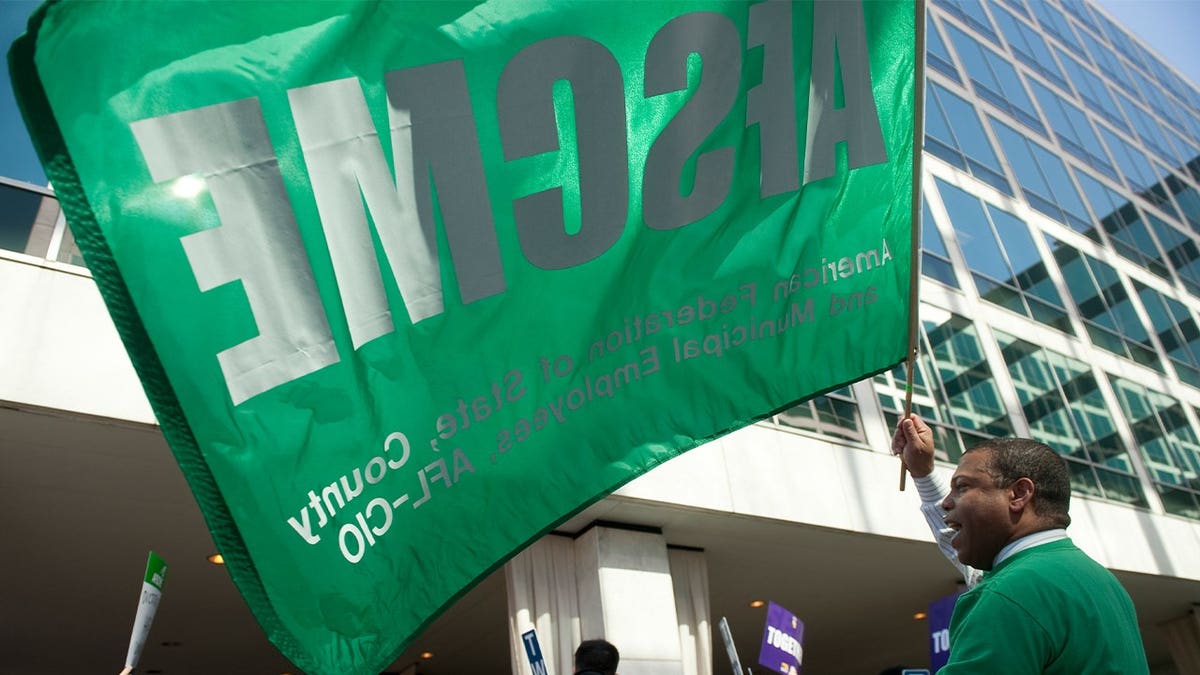 green union flag being waved
