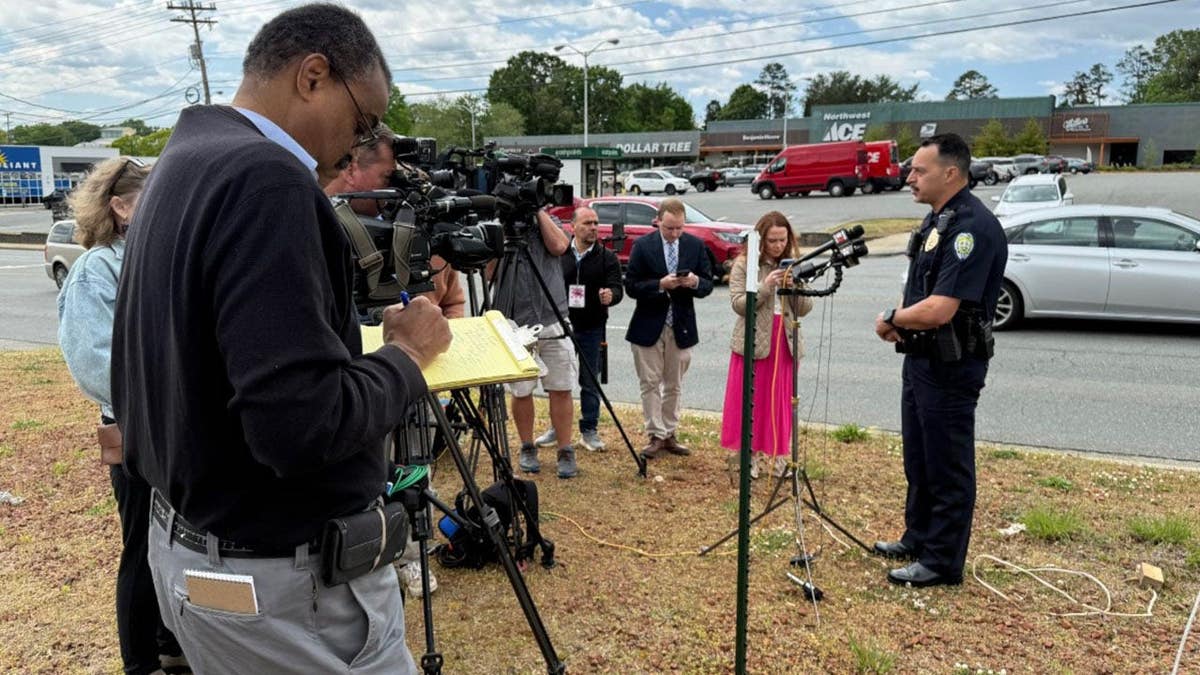 Winston-Salem Police Department Assistant Chief Jason Swaim talks to the media.