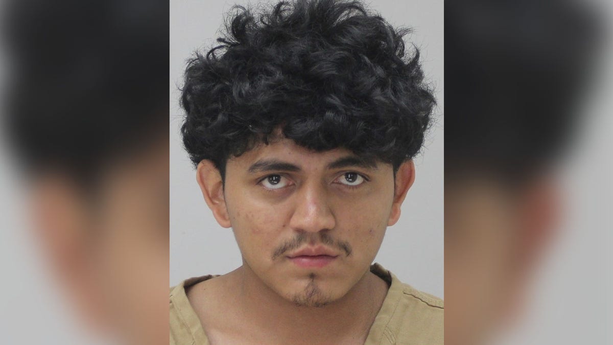 Mugshot of Keyner Ariel Calero Jiron facing camera against a neutral background