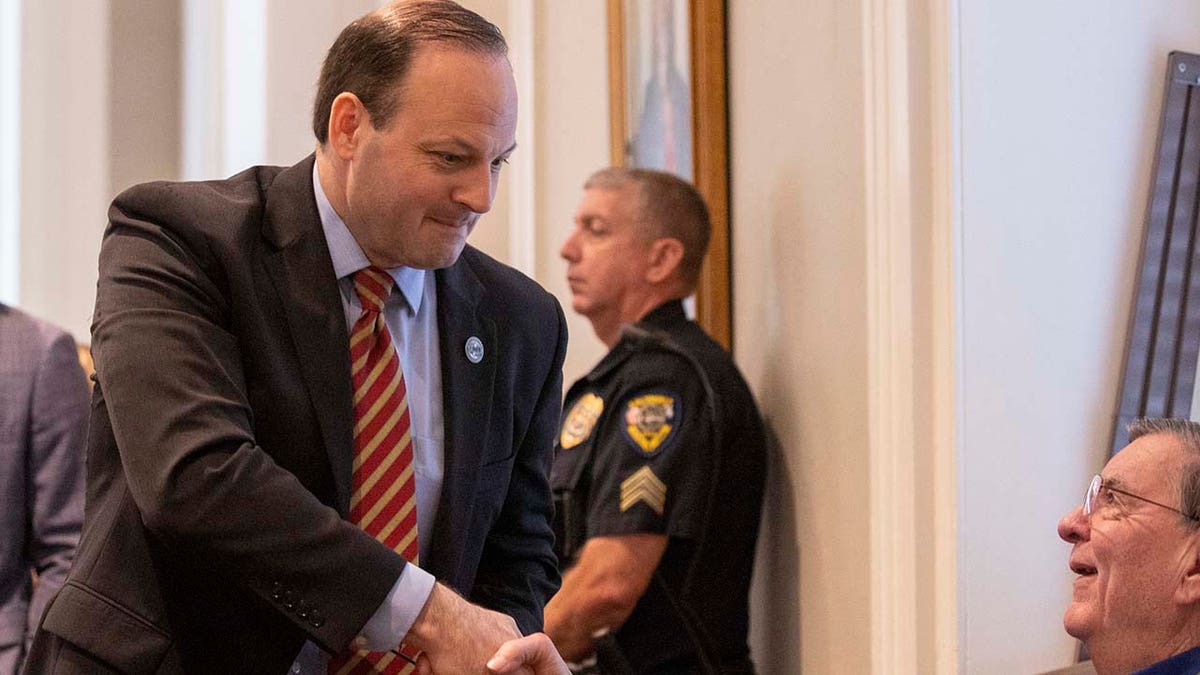 South Carolina Attorney General Alan Wilson shaking hands with the bailiff at Colleton County Courthouse
