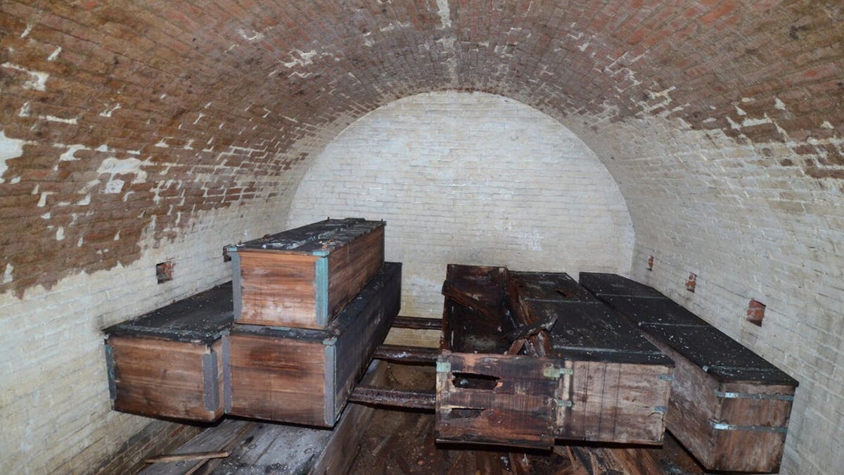 Several old crypts next to each other.