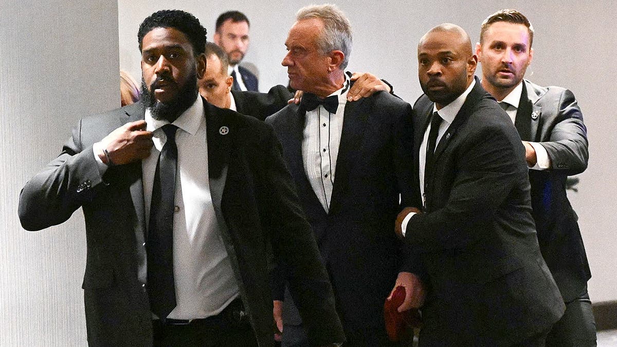 RFK Jr. escorted out by Secret Service after shooting at event.
