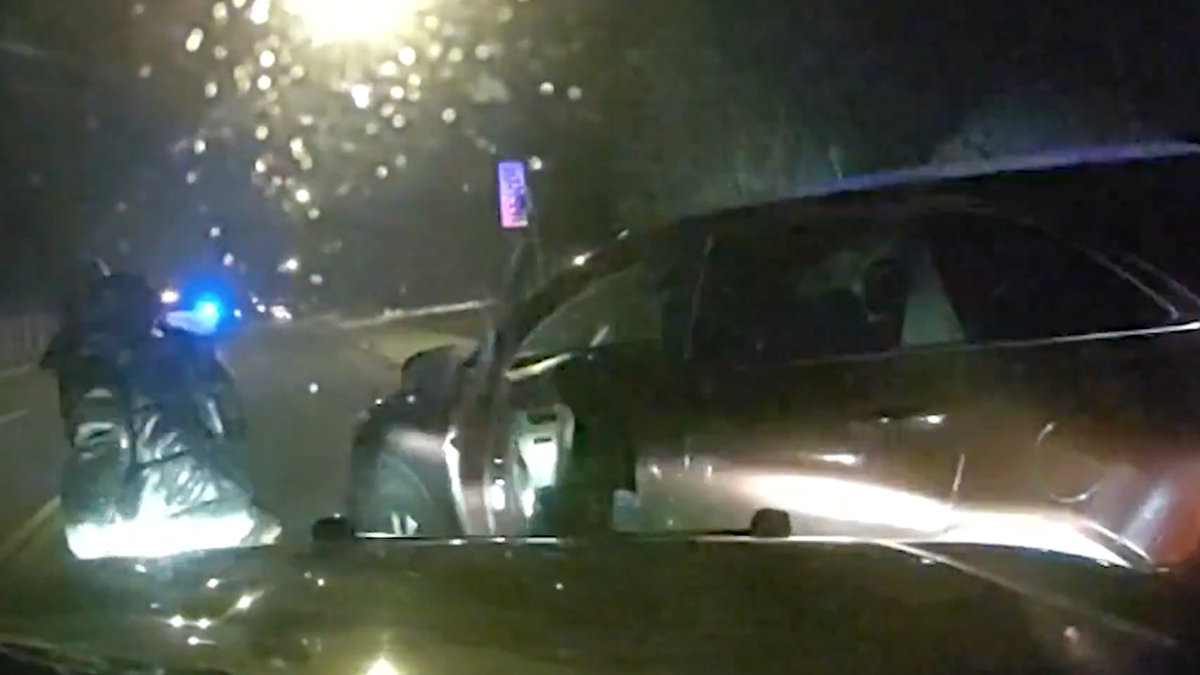 Aurora police officer approaches stolen vehicle after PIT maneuver during overnight chase