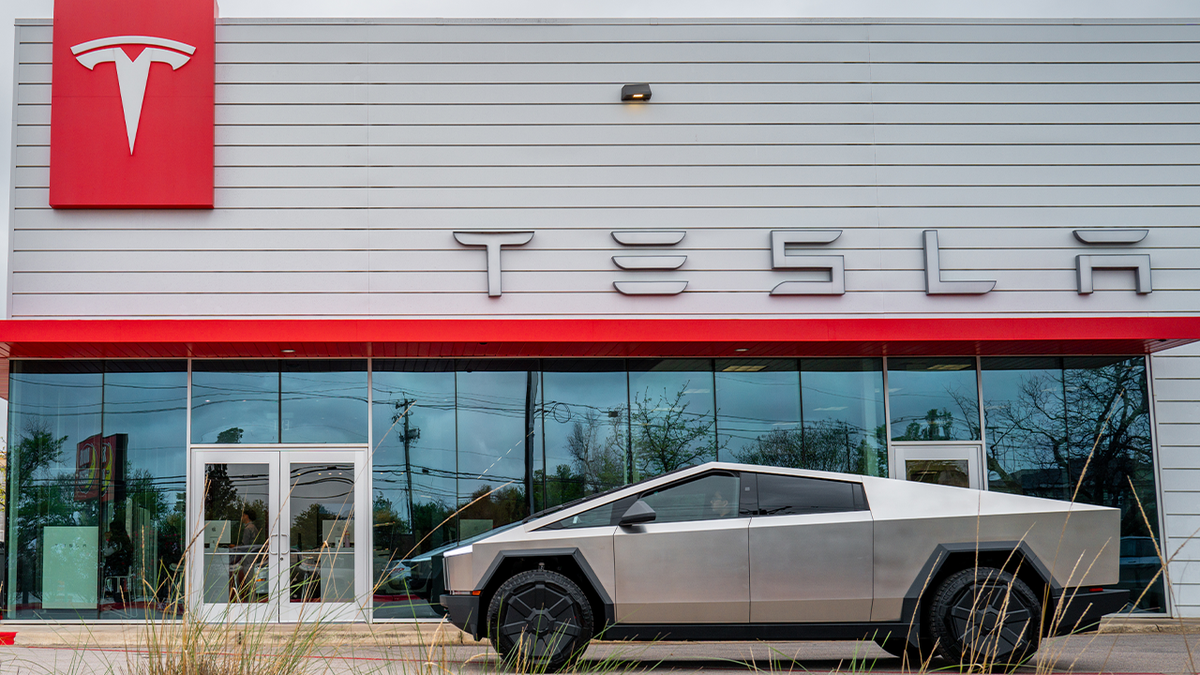 Tesla Cybertruck driving on a city street in New York