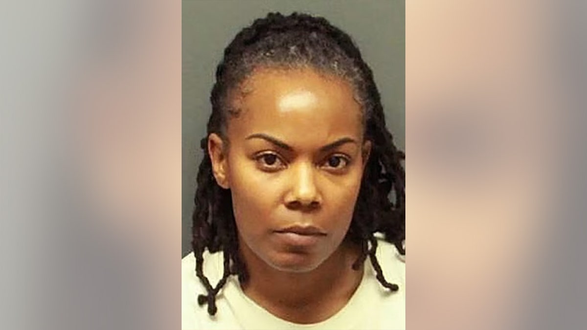 Ebony Parker facing forward in a mugshot photo