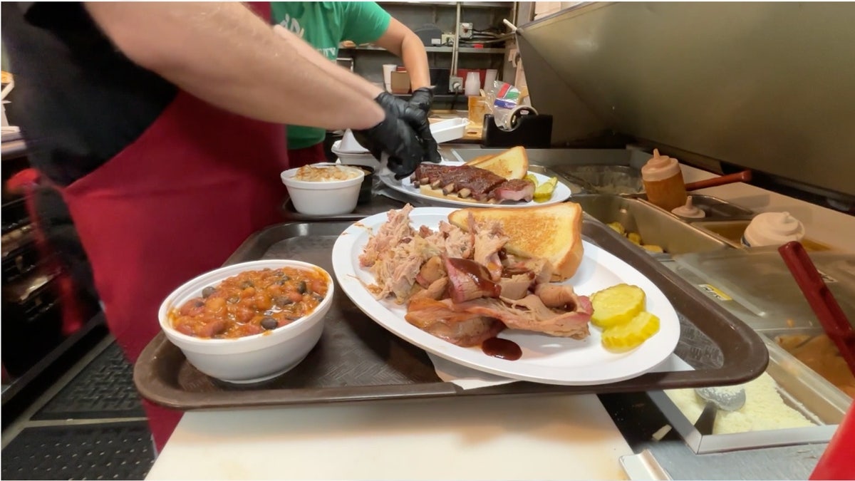 Kansas City barbecue platter with smoked meats, beans and toast at Joe’s Kansas City Bar-B-Que.