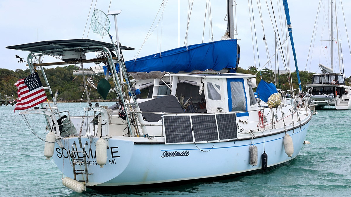 The sailboat Soulmate owned by Brian and Lynette Hooker floating in calm water in Marsh Harbour Bahamas
