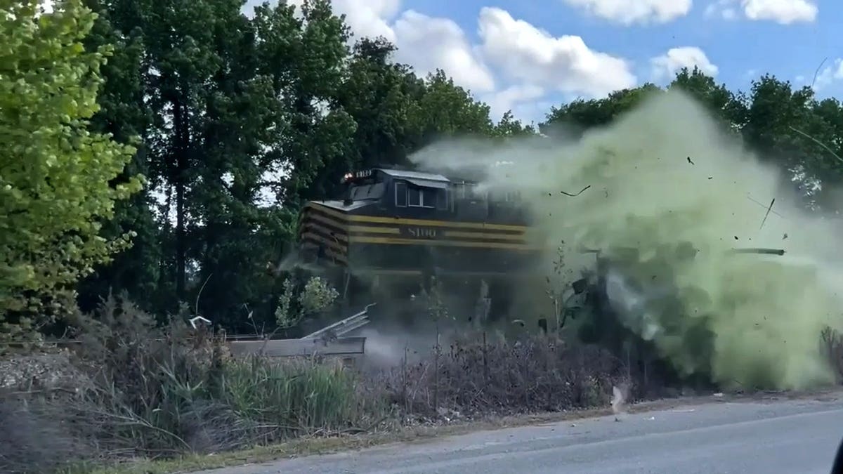 Aftermath of a train hitting a septic truck.